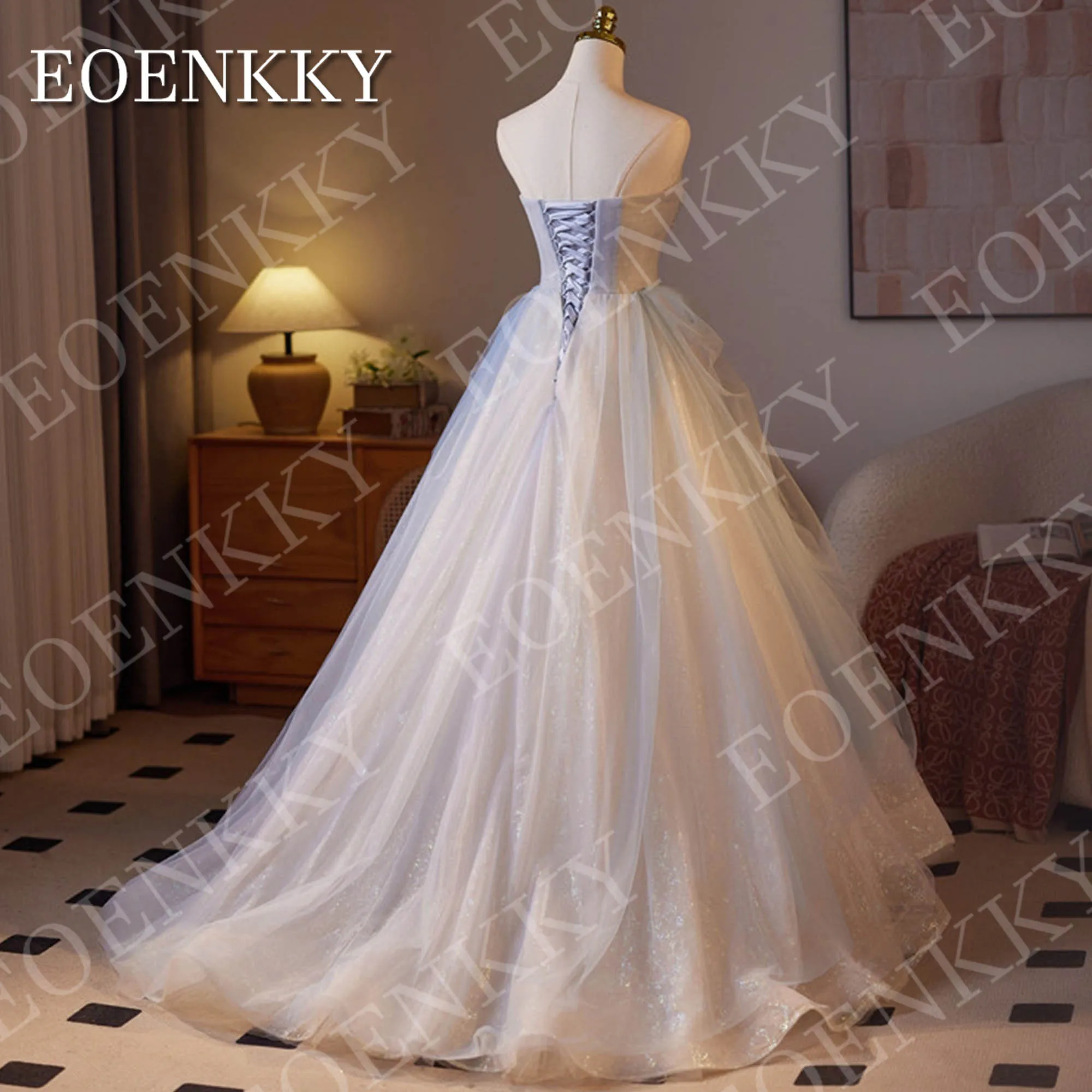 فستان EOENKKY فاخر باللون الأزرق الفاتح للحفلات الراقصة 2025 على شكل قلب ترتر خرز الأميرة اللامعة على شكل فراشة تول فساتين التخرج مخصصة فستان الرفيعة الزرقاء الفاخرة 2025 حبيبتي بائكة حبة الأميرة براقة فراشة تول فساتين