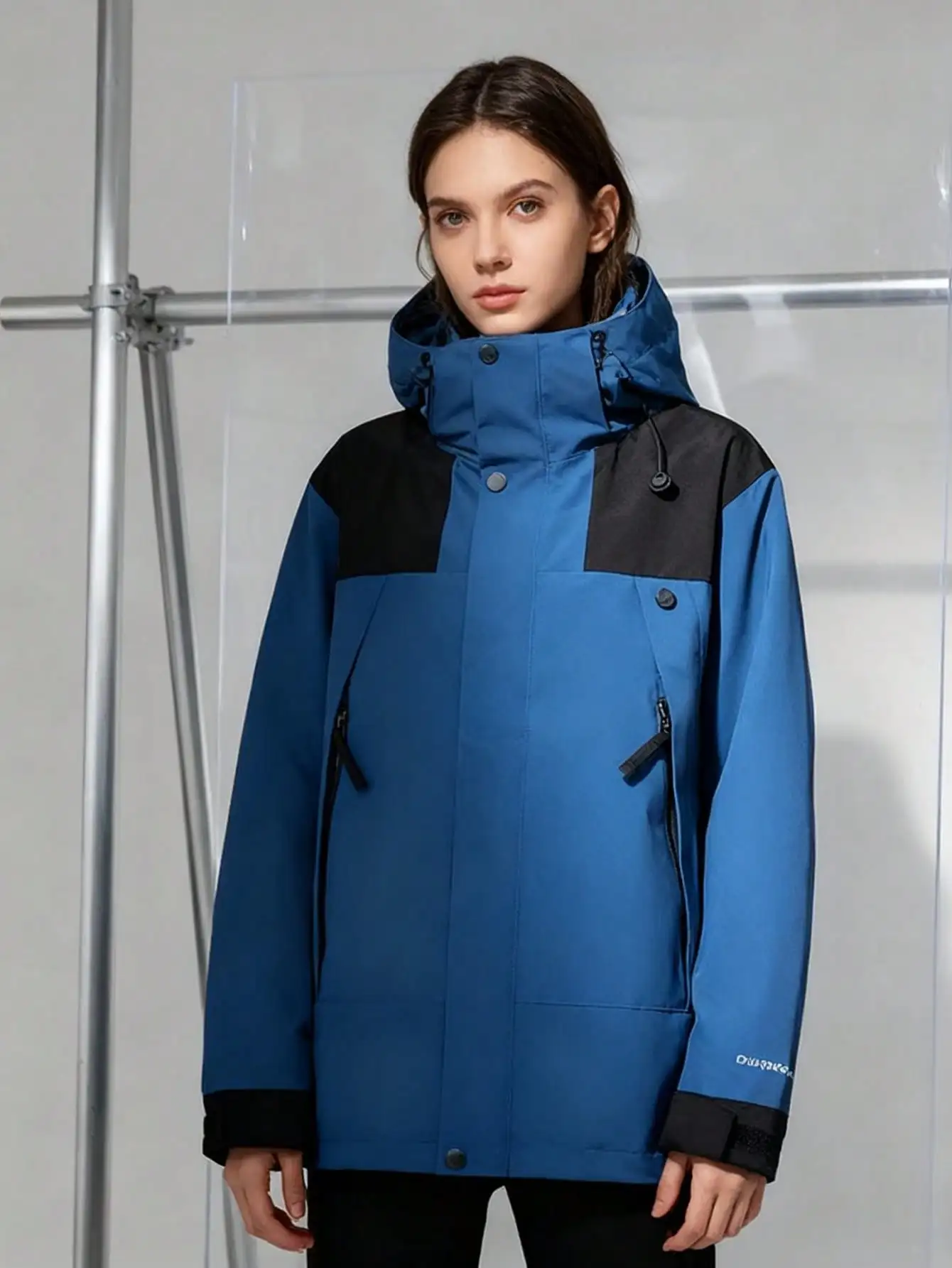 

Women's Blue Outdoor Windproof Jacket with Detachable Hood and Zipper Pockets