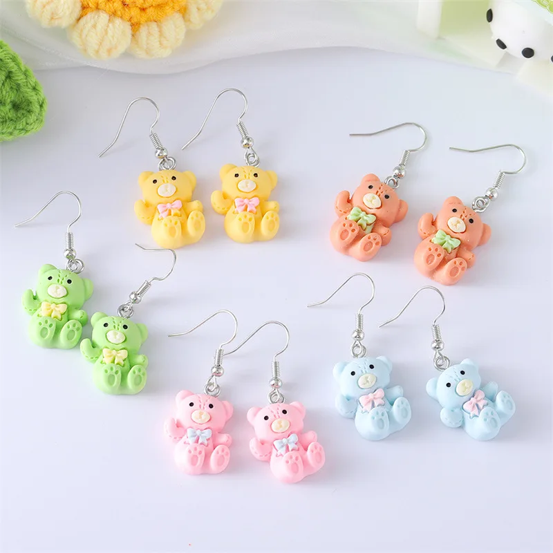 Korean version of personalized trend candy color pressed line bear earrings, cartoon cute three-dimensional bow ear