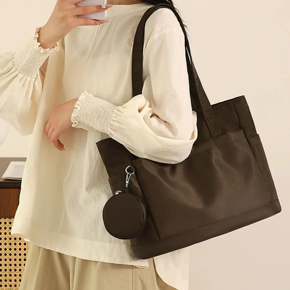 

Versatile Nylon Cloth Shoulder Bag Large Capacity Solid Color Canvas Tote Bag Simple Japanese Style Commuting Handbag Girls
