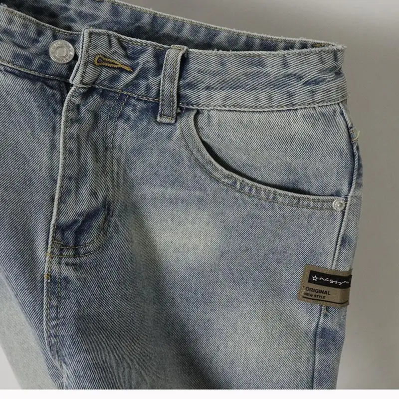 กางเกงยีนส์ขาสั้นผู้ชายสไตล์เกาหลีสำหรับฤดูร้อน กางเกงลำลองทรงเรโทร สไตล์คาวบอยหลวมๆ  กางเกงขาสั้นยีนส์สตรีทแวร์สำหรับผู้ชาย