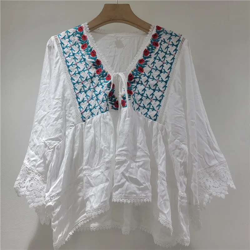Clothland Women Elegant White Floral Embroidery Blouse Lace Up Wide Sleeve Shirt Loose Casual Tops Blusa LB454