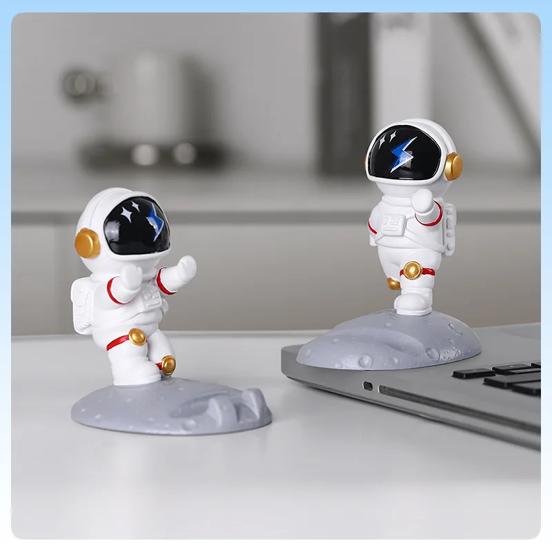 

Новая фигурка космонавта, подставка для телефона, космический путешественник, настольный держатель, декоративная фигурка в скандинавском стиле, креативная игрушка в подарок