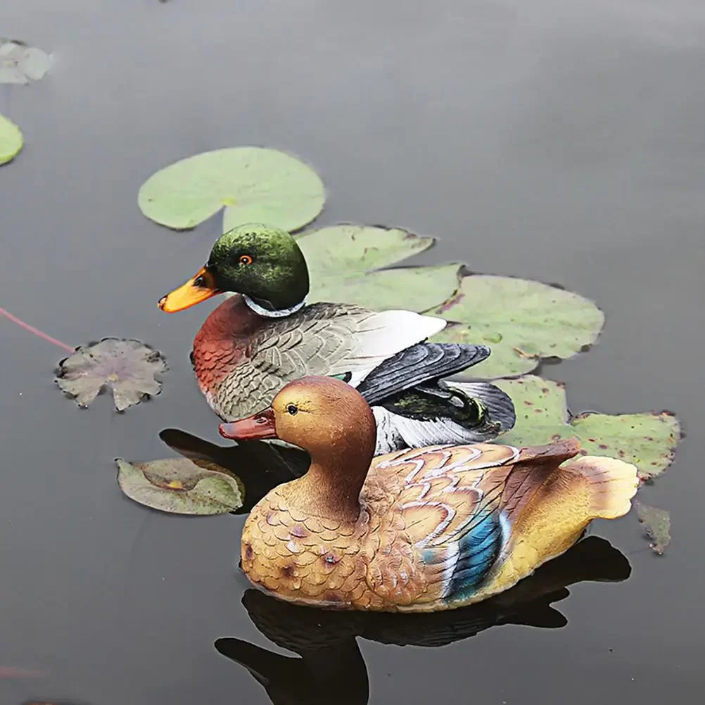 創造的な樹脂のフローティング彫刻,屋外のアヒルの彫像,庭の池,かわいい動物の彫刻,家の装飾