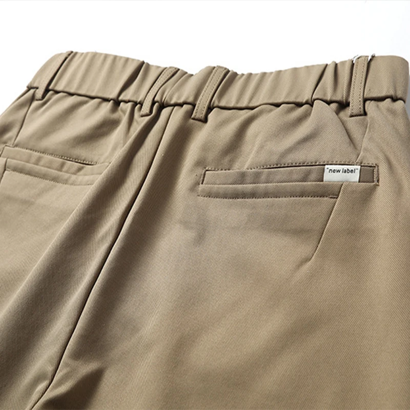 Pantaloni da lavoro in cotone per uomo nuovi pantaloni da uomo Slim Fit in vita elastica classica di alta qualità autunno pantaloni lunghi in tinta unita