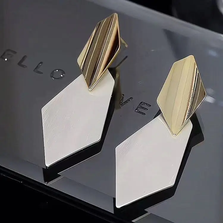 

and silvercolor matching irregular rhombus earrings women's light luxury niche design sense exaggerated round face thin earrings