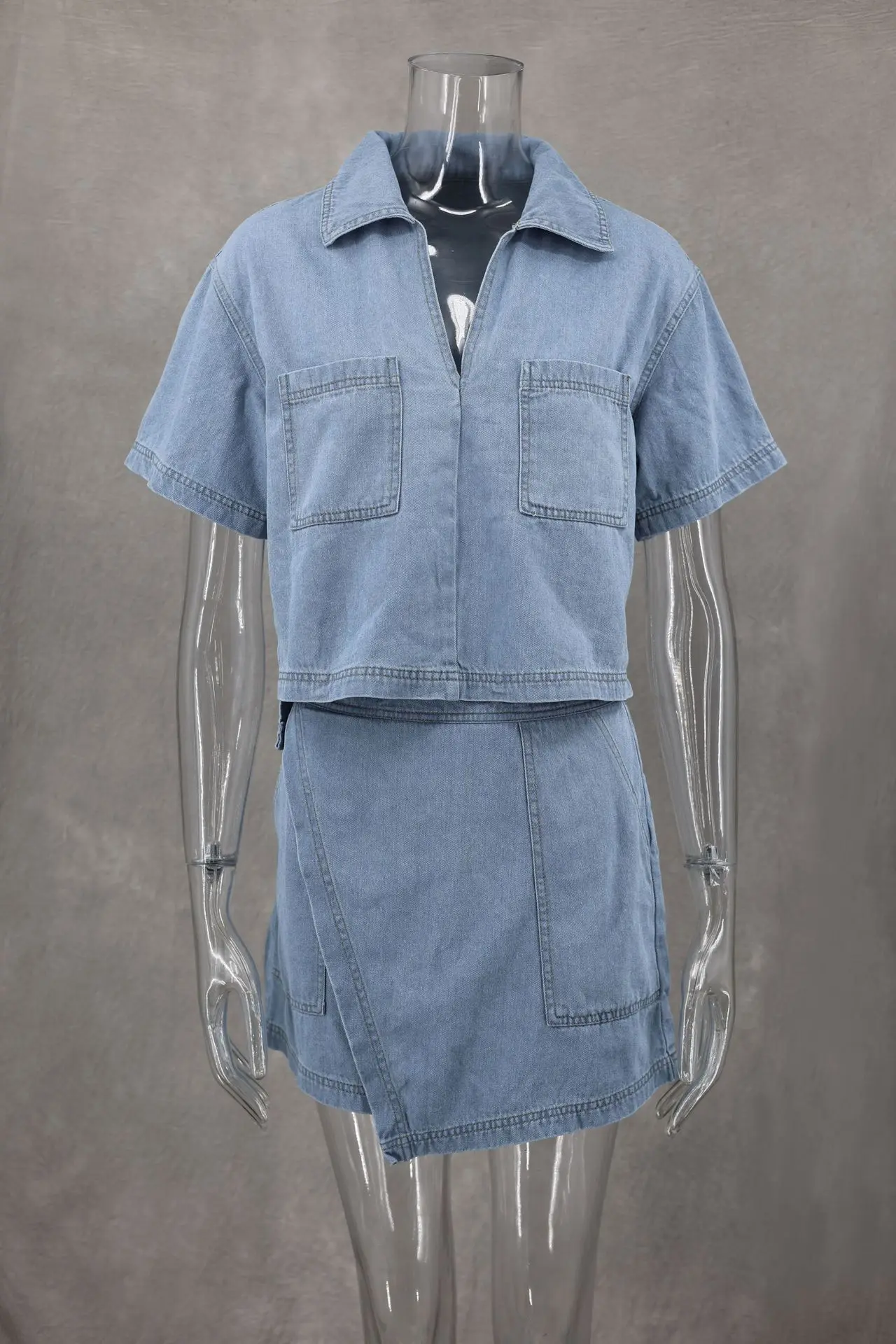 2024 Summer Women Blue Denim Skirt Suit Loose 2-częściowy zestaw z krótkim rękawem z kieszenią i nieregularną spódnicą dla kobiet Street Out