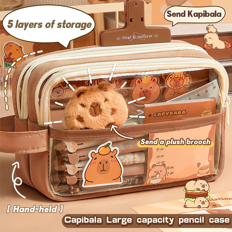 

Dolphin pencil case set, including brooch, key pendant, stickers, and other stationery items, suitable for daily storage