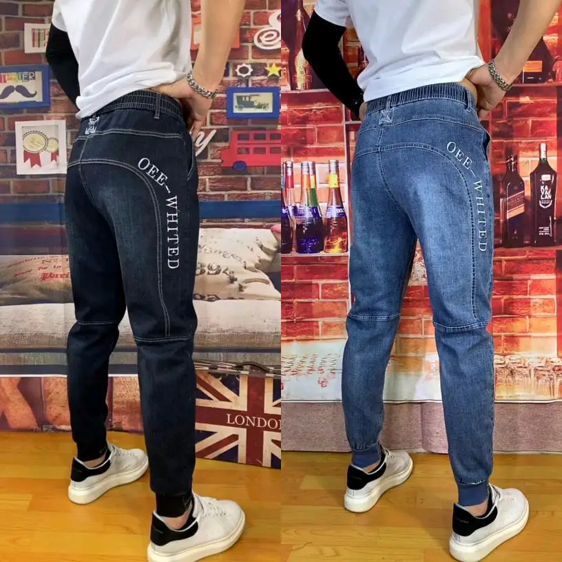 

Мужские джинсы Slim Fit: модные, с вышивкой, эластичные, свободного прямого кроя, длинные брюки для повседневной носки, городской стиль, молодежные, подходят для молодежи