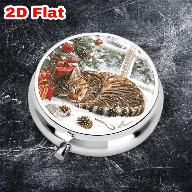 A Single Portable Round Metal Pill Box with Three Compartments Features a Charming Winter Scene: a Sleeping Cat Surrounded by Various Holiday Decorations, Perfect for Storing Medication or Holiday Supplies.