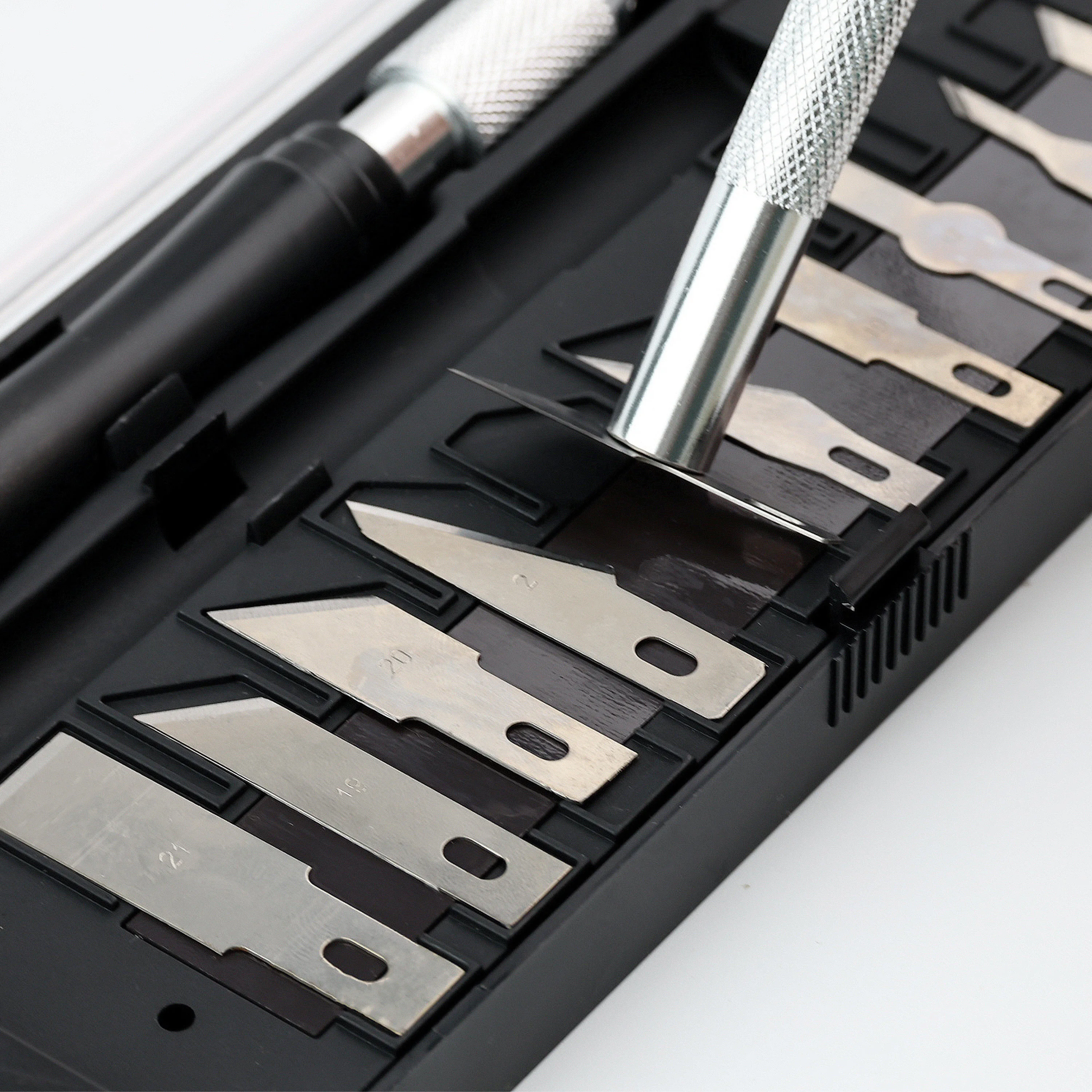 A 12-piece set of engraving knives, engraving blades, knife engraving tools, and hand tools for making paper-cutting models