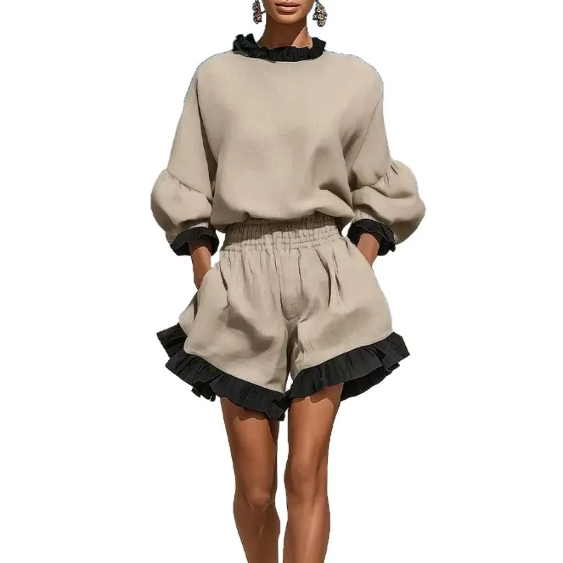 Two-piece Set of Women with A Ruffled Long-sleeved Top and High-waisted Wide-leg Ruffled Hem Shorts， Featuring A Stylish Design.