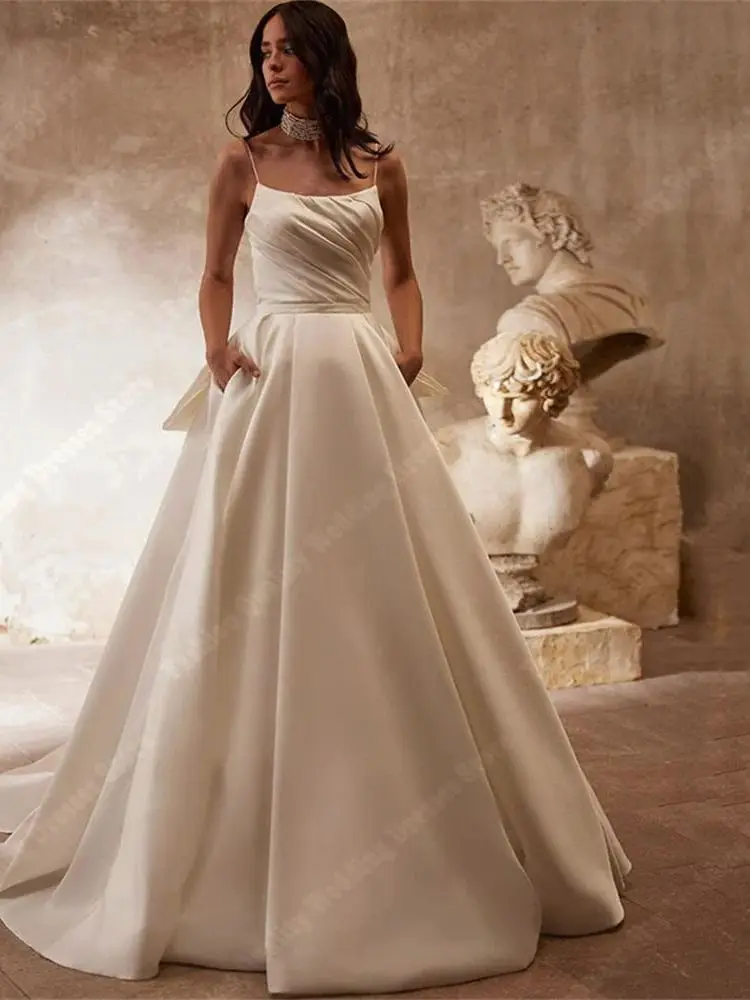 Robes de mariée à surface en satin de qualité supérieure, appliques d'ourlet de jupe super moelleuse, style minimaliste, patients A-ligne, quelles que soient les robes de mariée dos nu