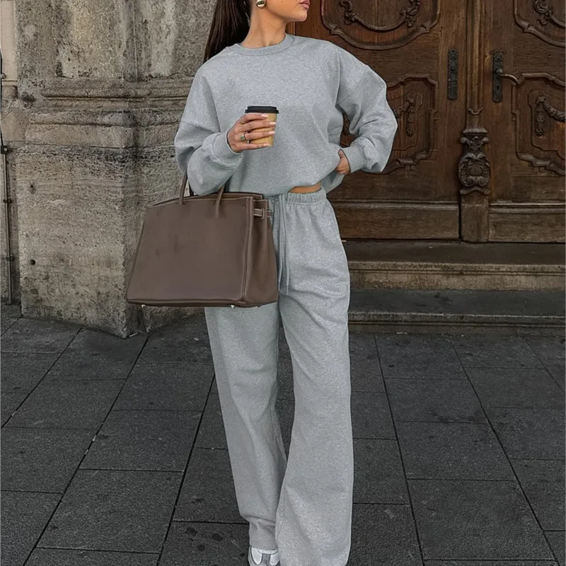 

Весна 2026: Новый женский повседневный серый комплект с худи, свободный топ с длинными рукавами и круглым вырезом, брюки на шнуровке, модный уличный стиль