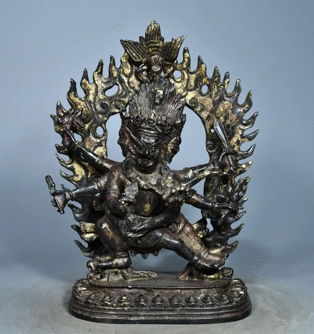 Tibetan brass Liu Tuo gold antique three-sided six-arm King Kong Huanxi Buddha statue ornament Home hall indoor products 24cm