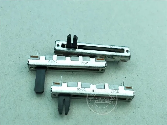 The B50K handle of Fd Taiwan 45MM straight-slide fader single-link potentiometer is 10MM long