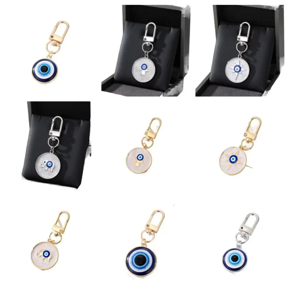 حساسة الراتنج ستار شيطان العين المفاتيح سبيكة النخيل التركية الأزرق العين قلادة نازف النفط حقيبة المعلقات الإناث