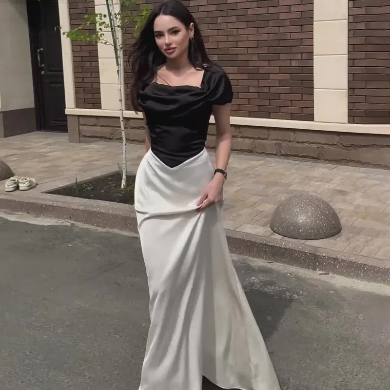 

Europe and The United States New Satin Slim Fit Black and White Splicing Contrasting Color Bubble Sleeves Long Strap-on Dresses