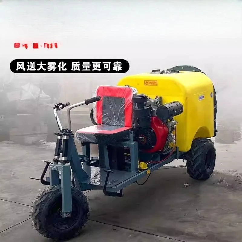 Self-propelled ride-on air delivery orchard fan atomizer