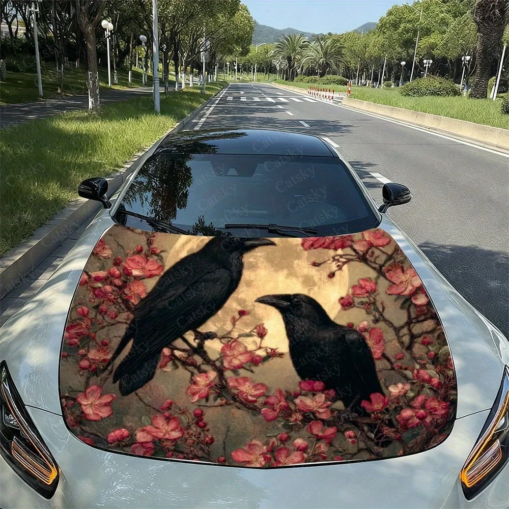 Elegant car hood design featuring two ravens amidst blooming cherry blossoms, perfect for nature lovers. Enhance your vehicle's