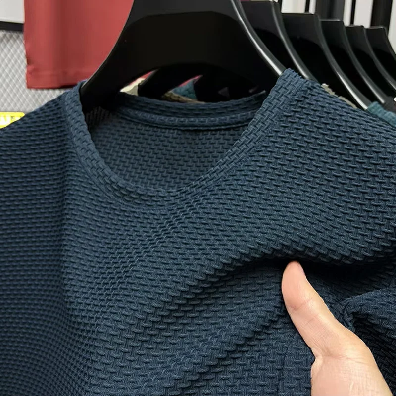 M-5XL verão novo masculino em torno do pescoço manga curta camiseta resistente a rugas e respirável textura superior tecido lazer versátil