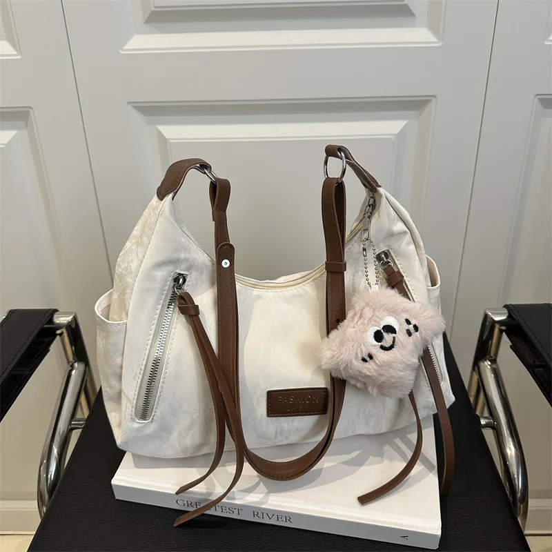 

​ 2025 nouveau sac с четырьмя выходами большой емкости для женщин à la mode boulette bag à bandoulière минималистичный décontracté sac à ban