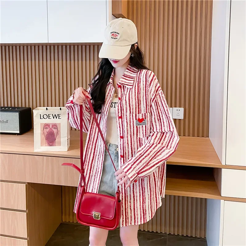 Printemps automne mi-long rayure chemise manteau femmes 2026 nouvelle mode lâche loisirs crème solaire chemise bouton amour motif Blouse femme