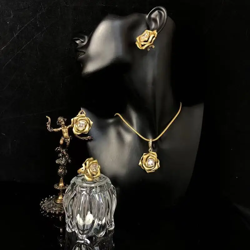 

New Fashion Elegant Golden Three-Dimensional Rose Necklace Earrings Ring Three-Piece Set Women's Jewelry Set High Quality