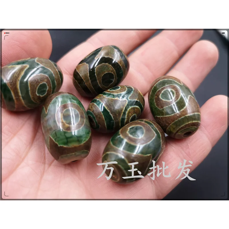 خرز عقيق Tianzhu ذو ثلاث عيون فضفاض