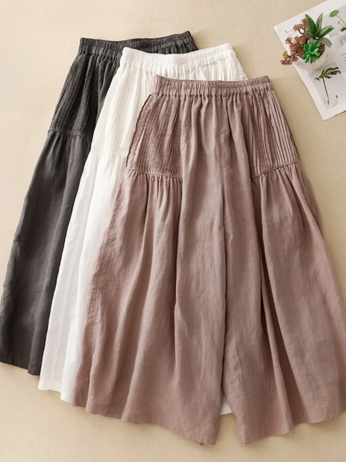 กางเกงกระโปรงทรงขากว้างสไตล์ญี่ปุ่นย้อนยุคสำหรับผู้หญิง ช่วงต้นฤดูใบไม้ร่วง ทรงหลวมสบายๆ จีบแบบพับได้ เอวสูง ดีไซน์ Driftin Nin...