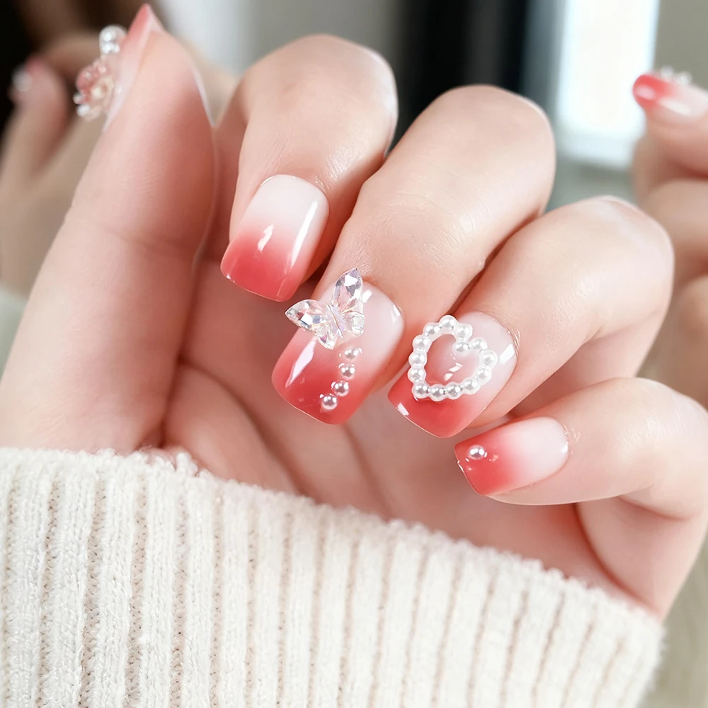 24 قطعة أظافر صناعية مربعة قصيرة متدرجة حمراء مع أحجار الراين على شكل فراشة ثلاثية الأبعاد اضغط على أطراف أصابع كاذبة لعيد الحب TD