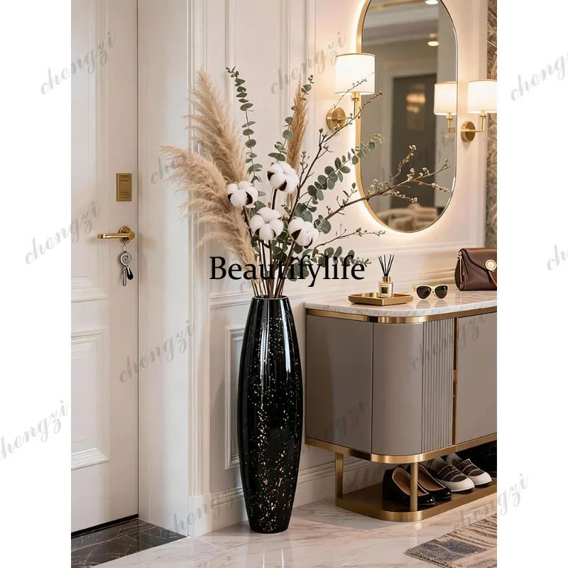 floor-to-ceiling vase glass transparent black flower arrangement long branch light luxury living room flower arrangement large