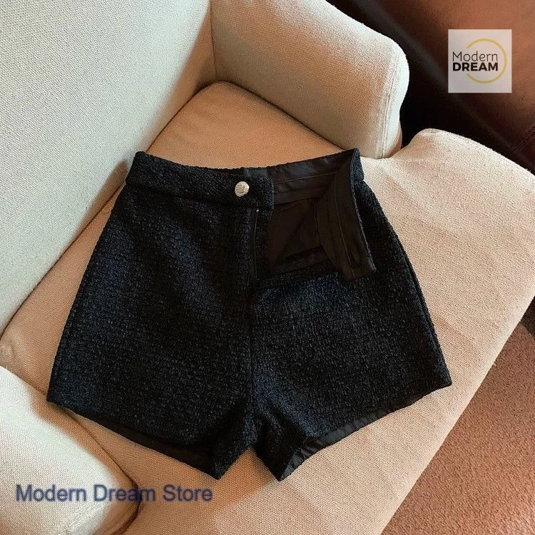 

Korean black woolen shorts women spring and autumn new niche Joker fashion high waist boots pants loose slim drape casual pants.