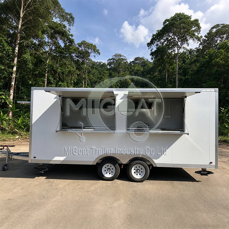 White Tandem Axle Food Trailer with Dual Serving Windows and Stainless Steel Workbench for Mobile Street Food Vending