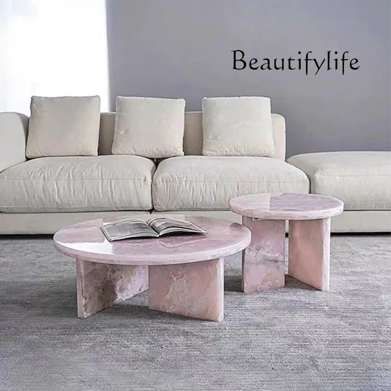 

Italian light luxury natural marble pink coffee table small apartment household round edge table combination coffee table