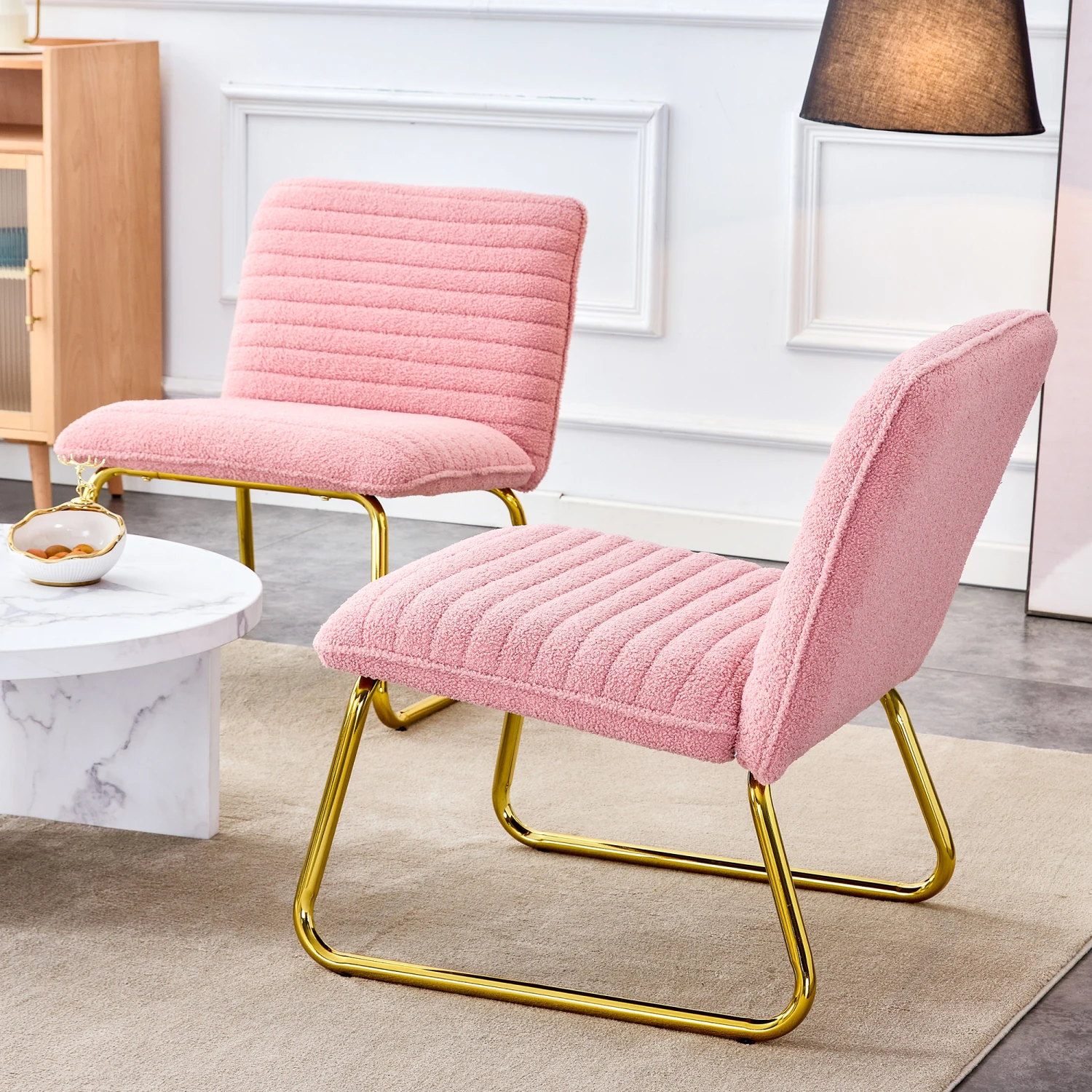 

Modern minimalist pink plush fabric single person sofa chair with golden metal legs. Suitable for living room, bedroom, club, co