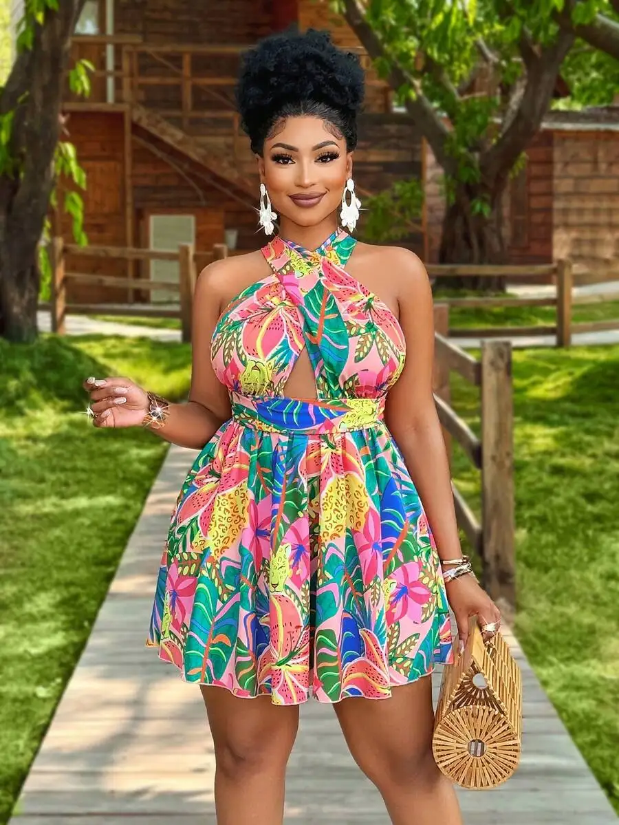 

Женское мини-платье без рукавов с вырезом на шее и тропическим принтом