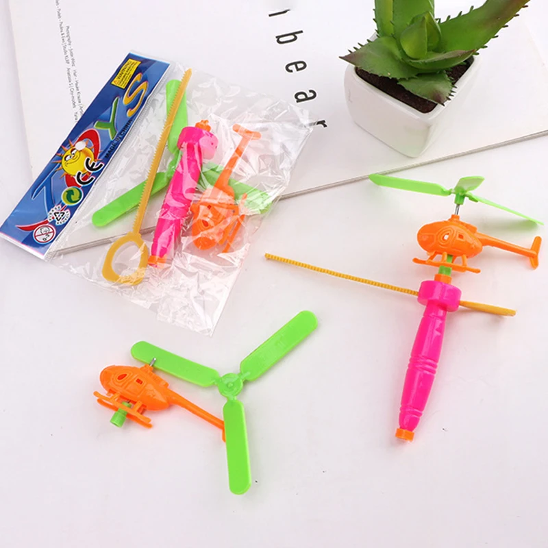 Children's Gift Aviation Model Copter Handle Pull Ruler Helicopter Plane Outdoor Toys For Kids Playing Drone Drawstring Plane