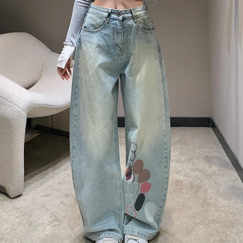 Pantalon en denim bleu aquarelle vintage pour femme de haute qualité avec un design ajusté et un jean à motif imprimé 2592488