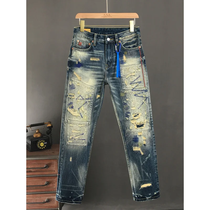 

Heavy duty ripped patch jeans for men in autumn, loose straight leg splicing, American style retro and cool, vintage long pants