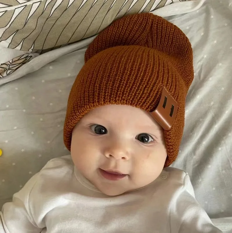 Children knitted wool pullover hat autumn and winter leather label solid color warm baby knitted cap with parent-child models