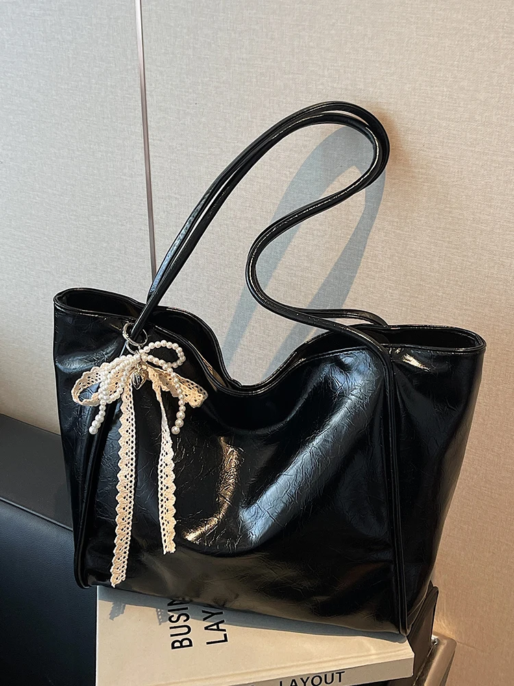 

Новая корейская версия, большая вместительная сумка, 2025, шикарная сумка из искусственной кожи с бантом, простые повседневные сумки