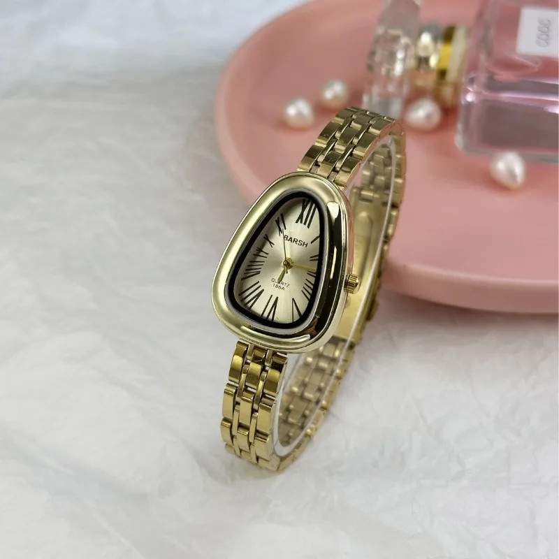 العلامة التجارية الشهيرة النساء غير النظامية الأفعى رئيس الهاتفي ساعة كوارتز فاخرة الفولاذ المقاوم للصدأ حزام ساعة اليد هدية Montre فام دروبشيبينغ