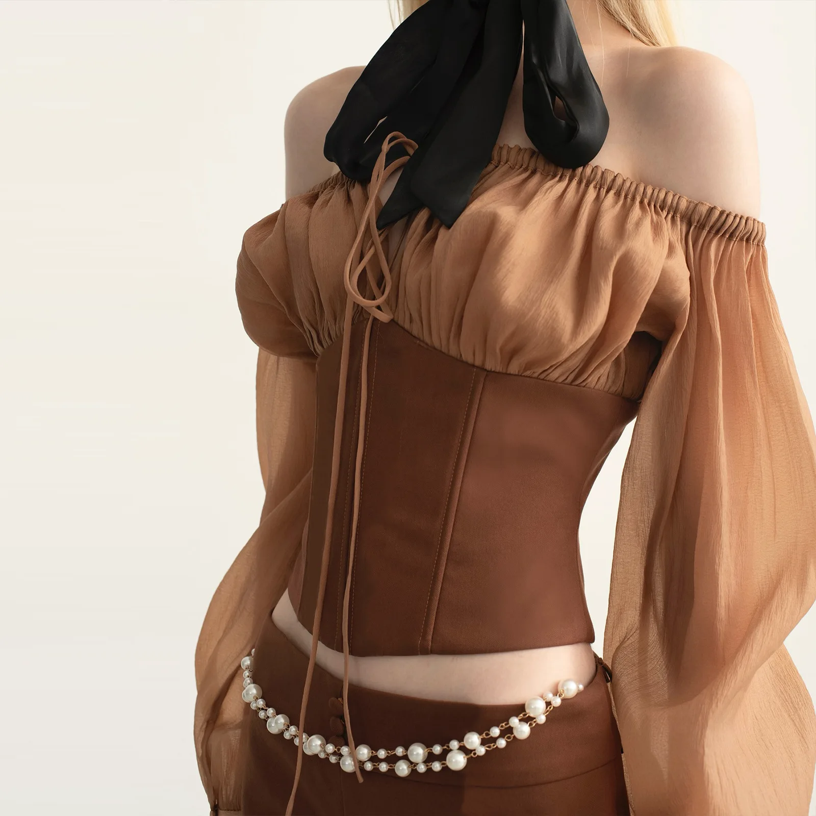 

New sexy one-shoulder retro mesh long sleeve top hip-hugging short skirt set for women