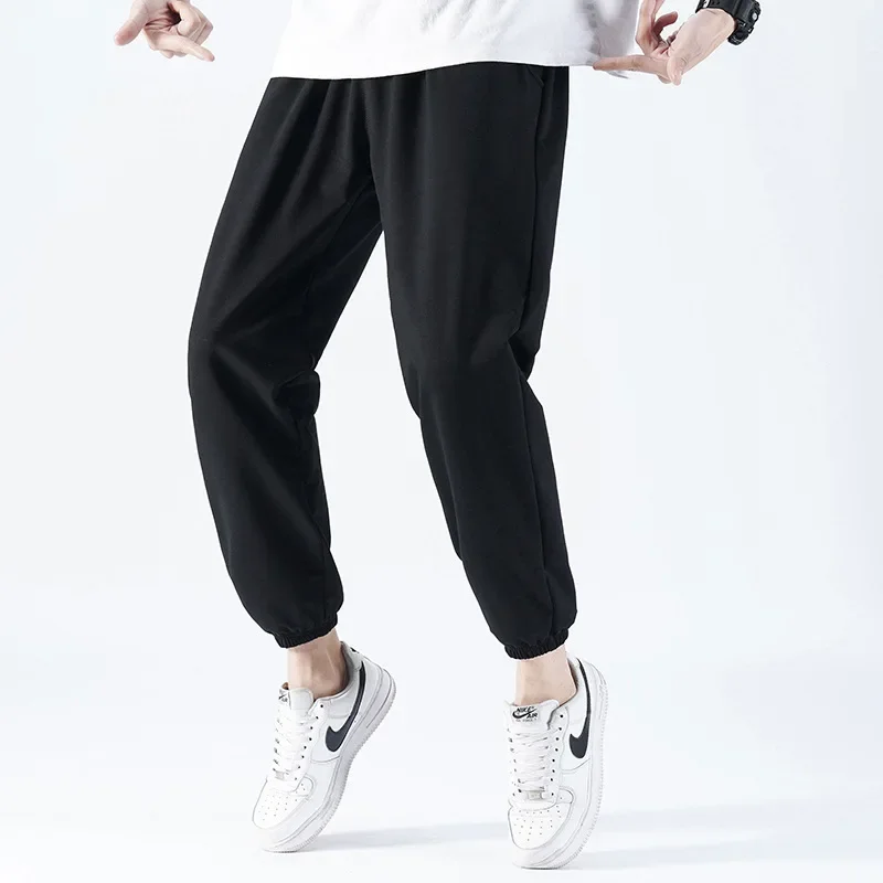 

Мужские брюки-карандаш длиной до щиколотки, однотонные повседневные брюки с эластичной резинкой на талии и карманами, узкие лоскутные спортивные брюки, новинка 202, весна-лето