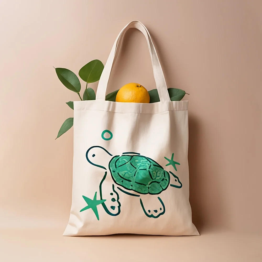 A Turtle pattern print canvas tote bag, suitable for daily use, shopping, school, and travel