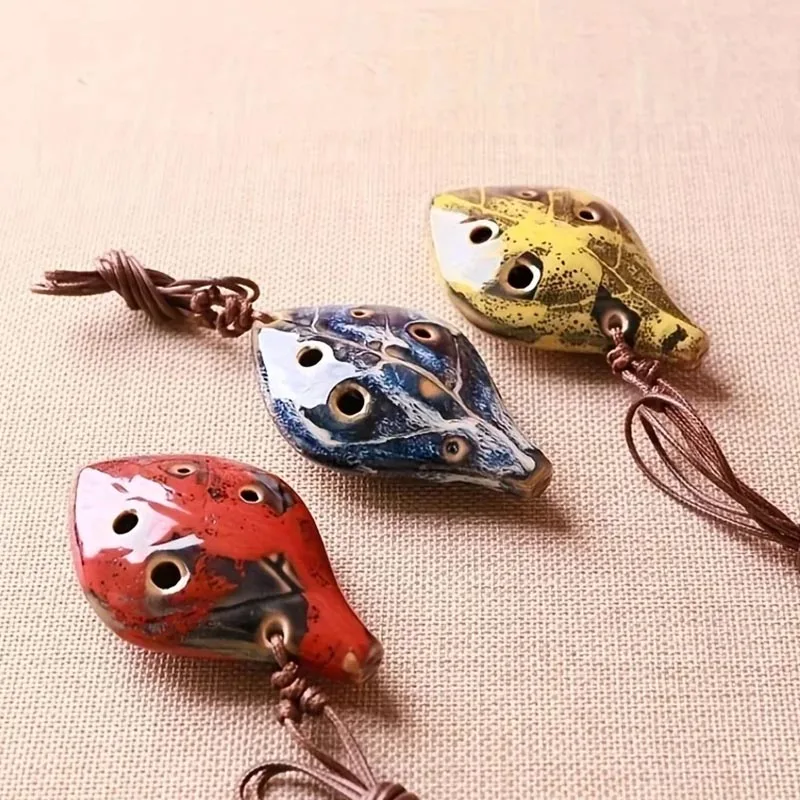 1pc ancient Chinese style ocarina, six-hole handmade ocarina instrument, pleasant sound, with lanyard, like a leaf