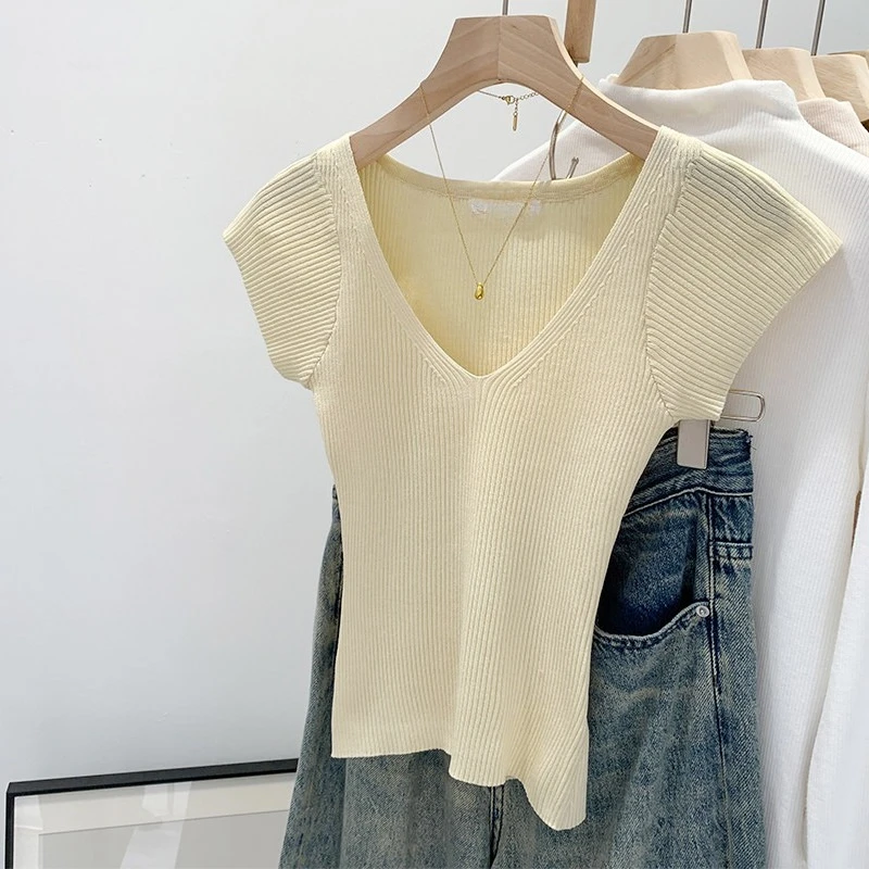 Pull en tricot pour femmes, col en V profond, manches courtes, côtelé, extensible, coupe ajustée, léger, décontracté, basique, pour l'été.