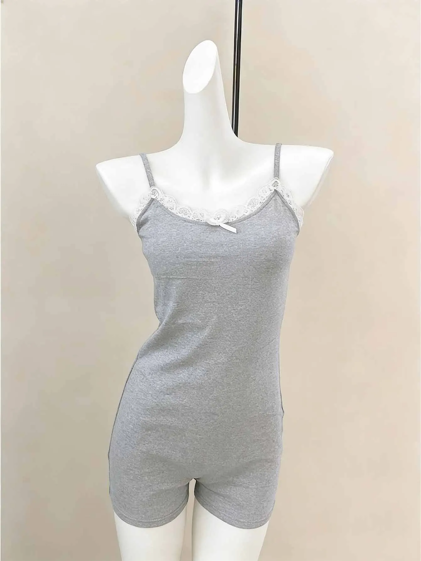 

Spring and summer sexy solid lace patchwork spaghetti strap tops European and American slim fit jumpsuit shorts women's clothing