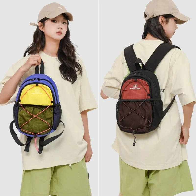 

Japanese-style dopamine color-blocking small outdoor backpack for college students, suitable for commuting and travel,